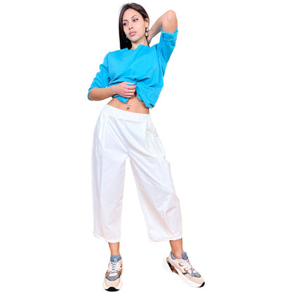 Pantaloni Larghi Bianchi Donna Piega alla caviglia Tessuto Punto Milano Fascia elasticizzata in vita Tasche laterali a scomparsa Colore Bianco Vestibilità larga e comoda Vestibilità Over Composizione Tessuto: 52%CO 40%PA 8%EA Taglia Unica Made in Italy Prodotto da Wendy Trendy Distribuito da 28dot8™